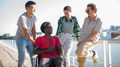 multicultural group on a boardwalk
